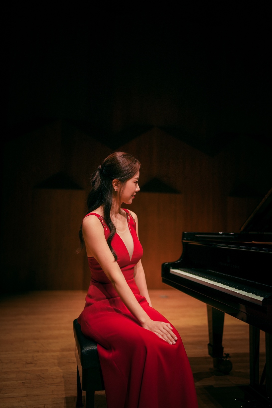 Jimin Han portrait in red dress